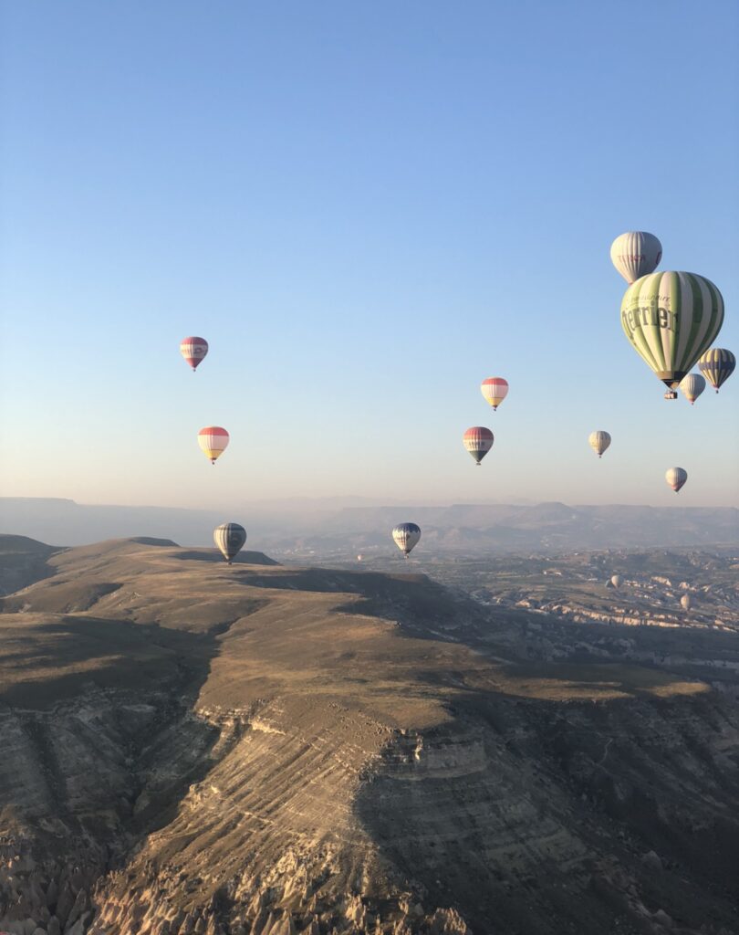 Stunning sunrise hot air balloon rides are a Top 10 Activity to Do in Cappadocia, Turkey