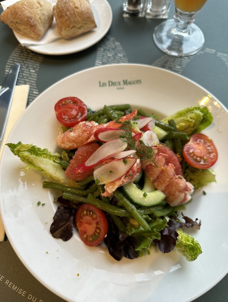 Dine at iconic cafes as a female solo traveler such as Les Deux Magots in Saint-Germain-des-Pres
