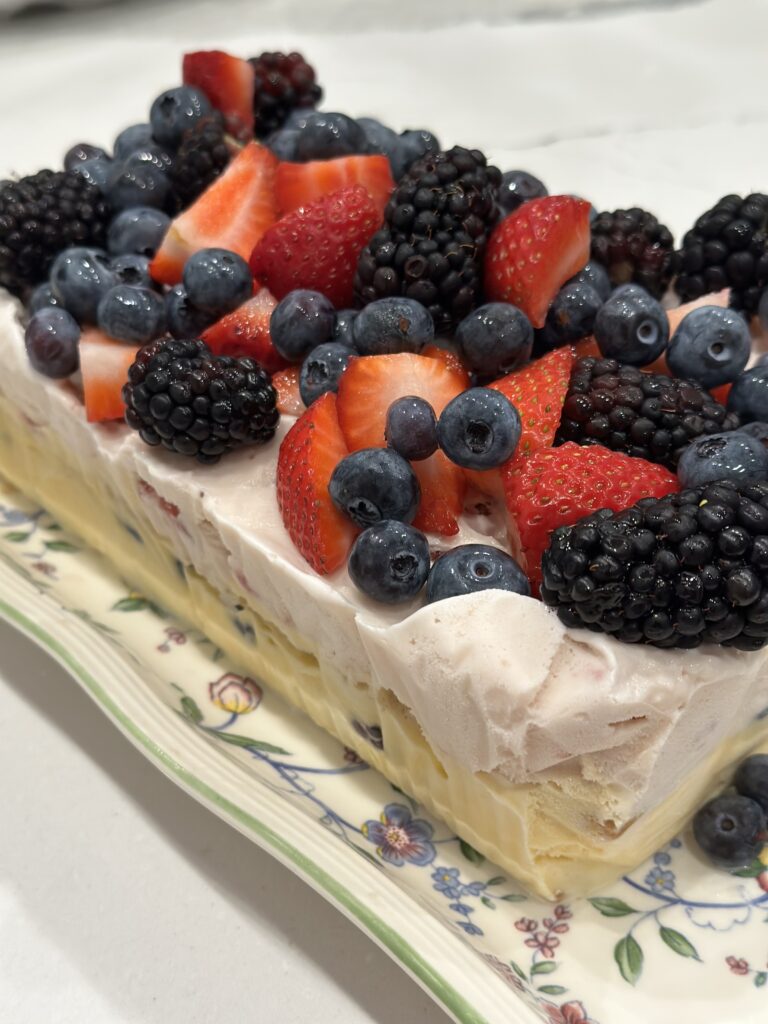 Add topping to your No Bake Mixed Berry Ice Cream Cake when ready to serve