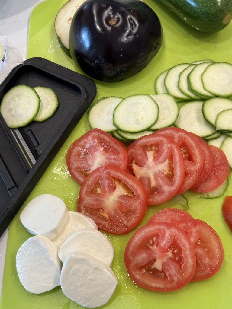 Thinly Slice Up Your Ingredients For Warm Eggplant Zucchini Caprese Stacks